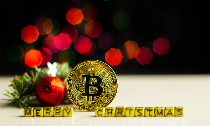 Christmas tree with a Bitcoin infront