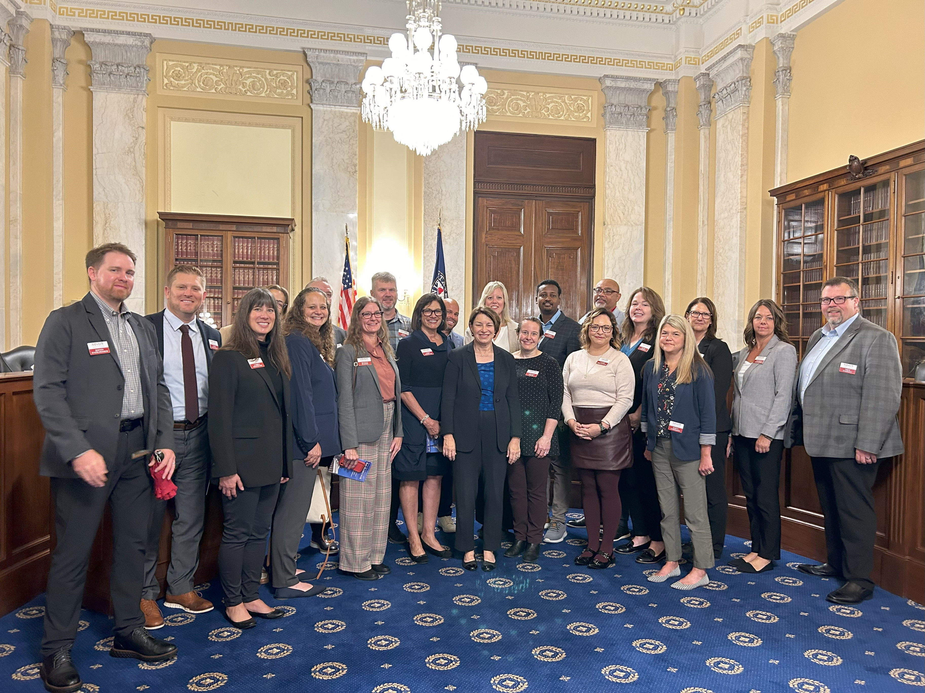 The Minnesota Education Policy Fellows standing with Senator Klobuchar.