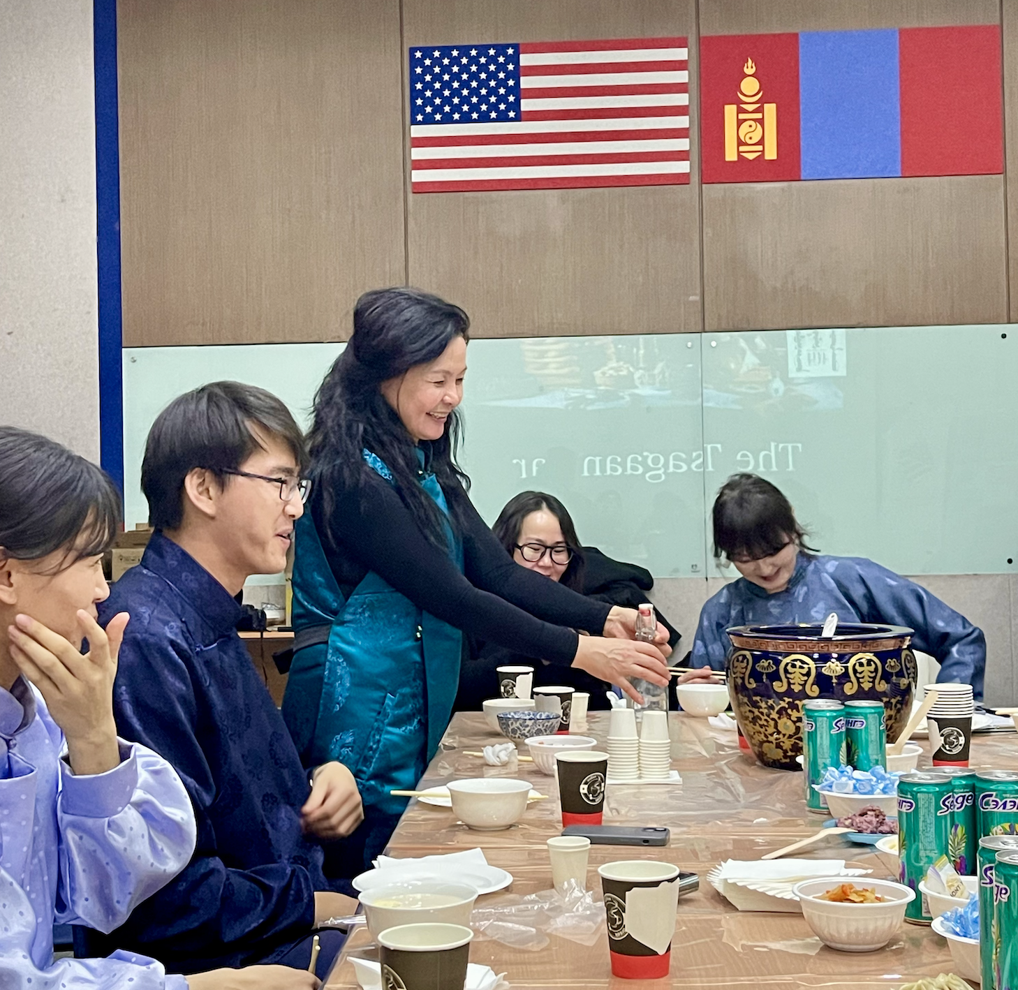 Hosts of the ACMS Tsagaan Sar Workshop Distributing food and drink to participants