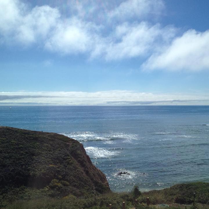 ocean view from path to beach below the Moss Beach Distillery