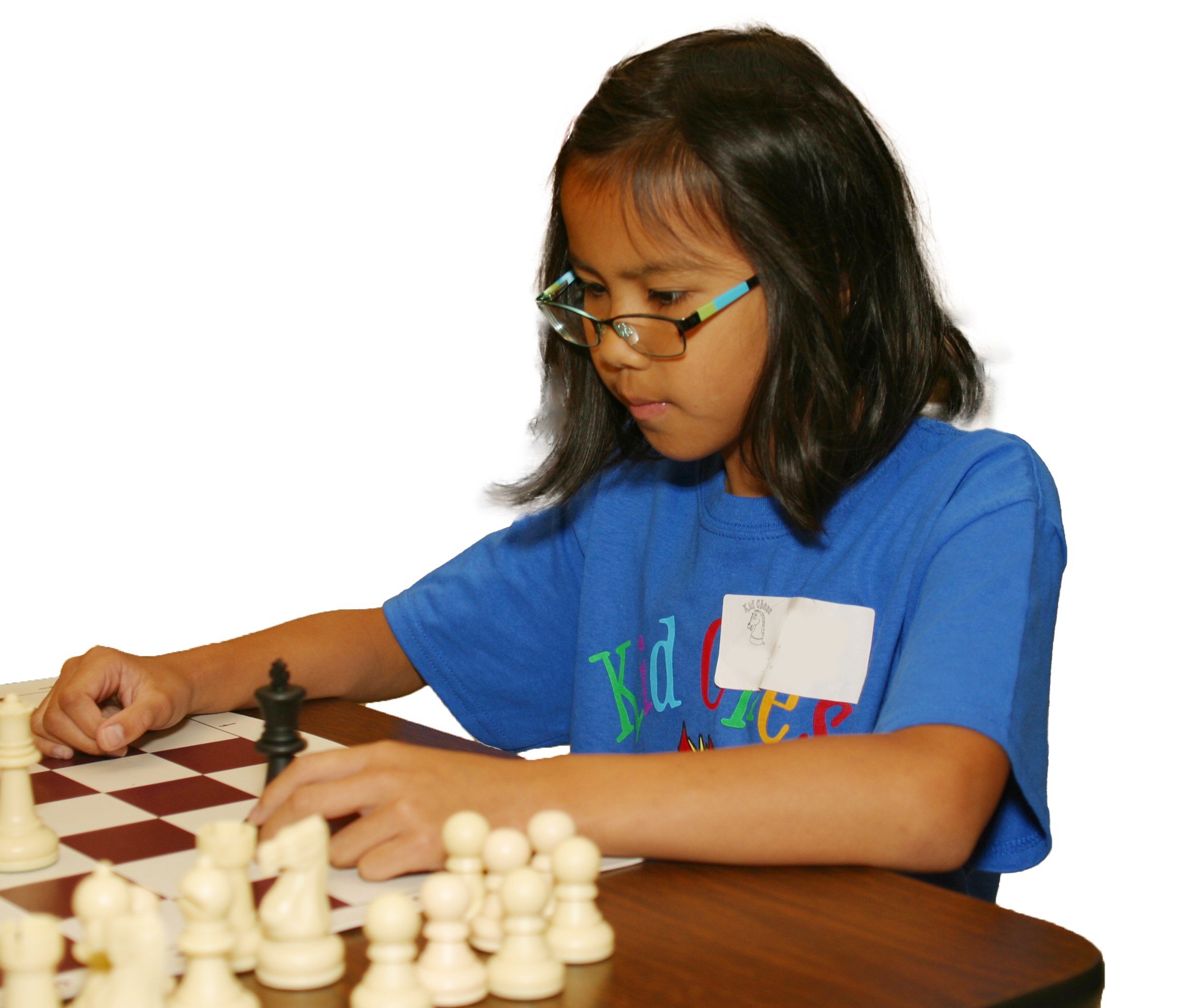 Bespectacled girl in blue shirt focusing over the board on her next move.