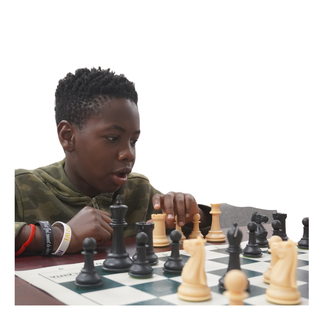 boy playing chess.