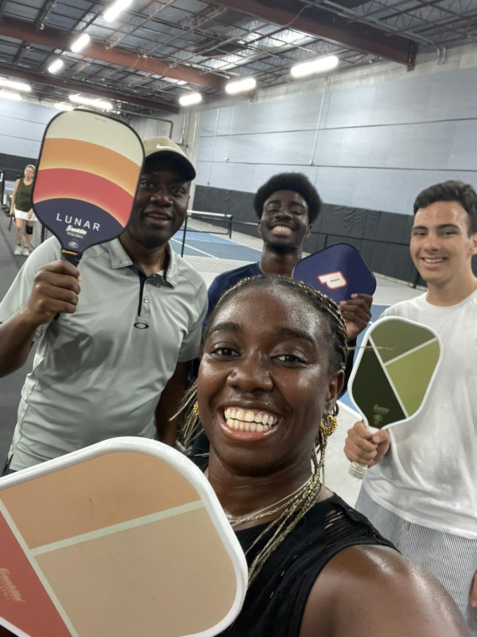 A game of pickleball with my kids and their friend