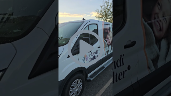 One of the Iconic Handi Quilter Vans
