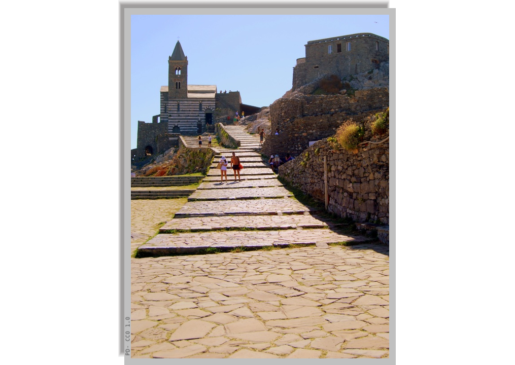 Stone paved of the path to Saint Peter church along the rocky promontory on which it stands
