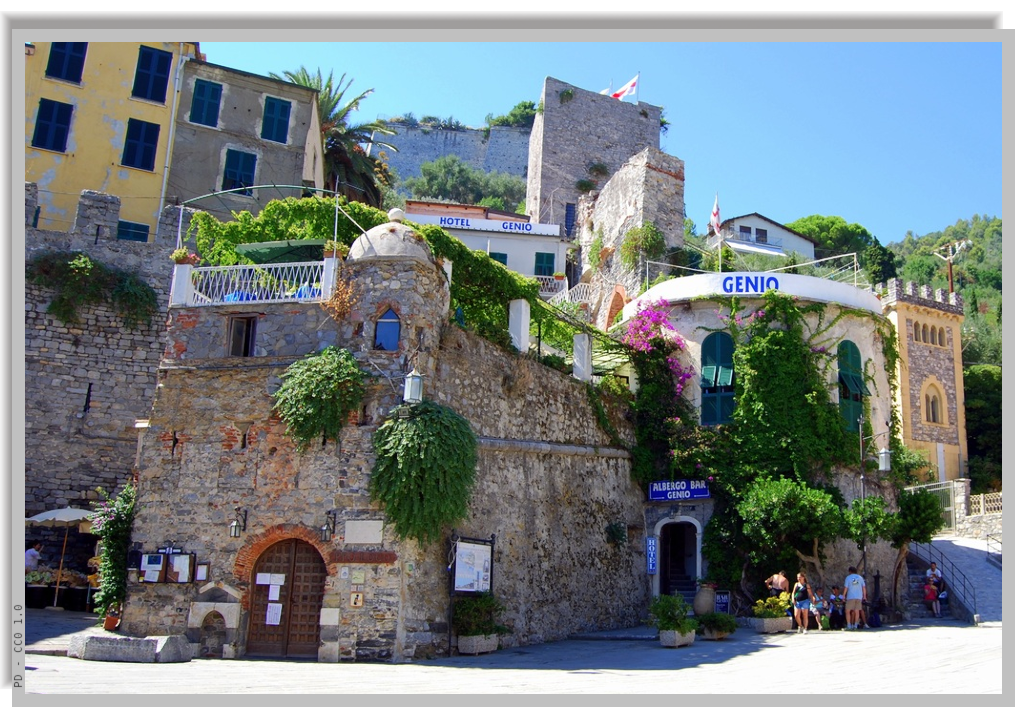 Ancient stone buildings with adjacent hotel