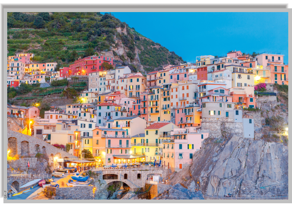The village of Manarola illuminated in the evening
