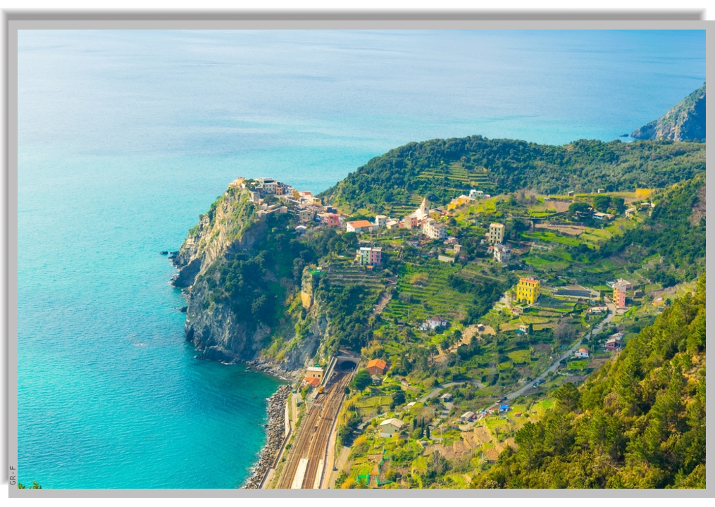 The Coastal village of Corniglia and the green land surrounding it, seen from above