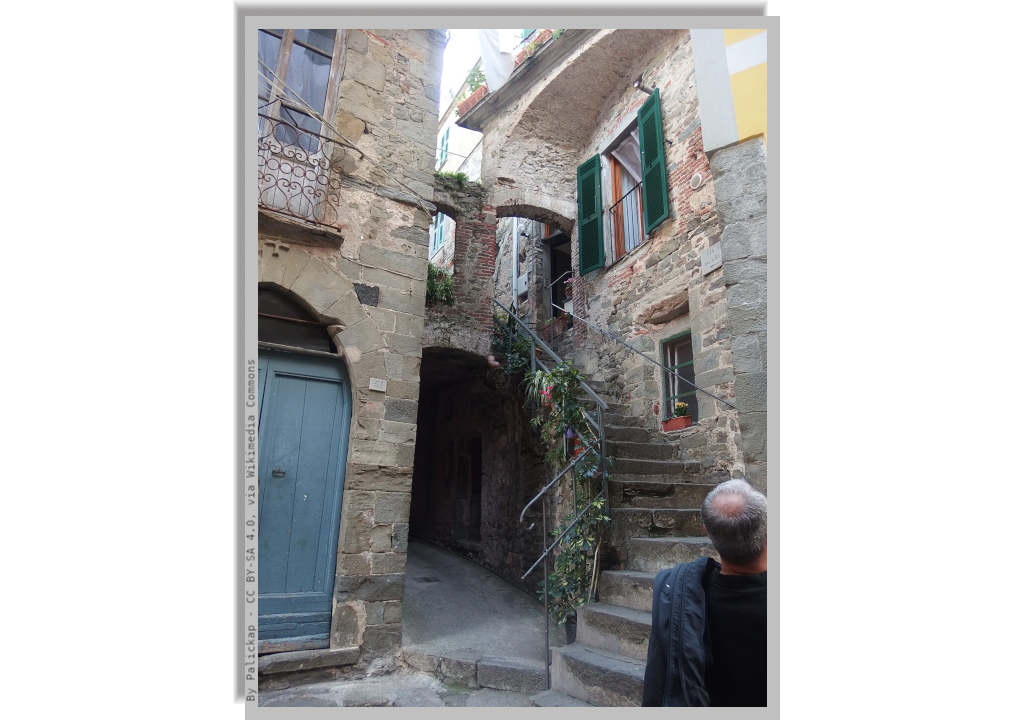 Old stone houses around a widening