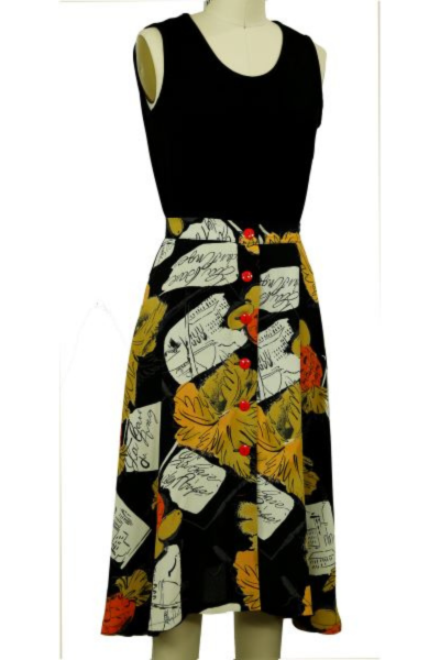 black, white and yellow skirt with black tank top