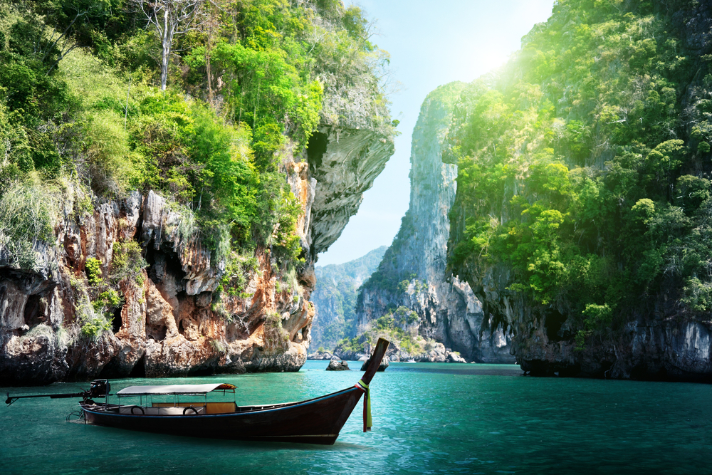 Explore tropical sport climbing and deep-water soloing in Thailand’s limestone cliffs with certified climbing guides.