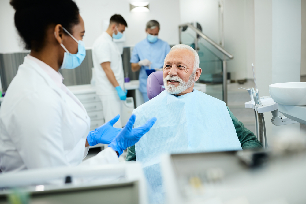 Close-up of proper brushing technique showing dental hygiene for implant maintenance