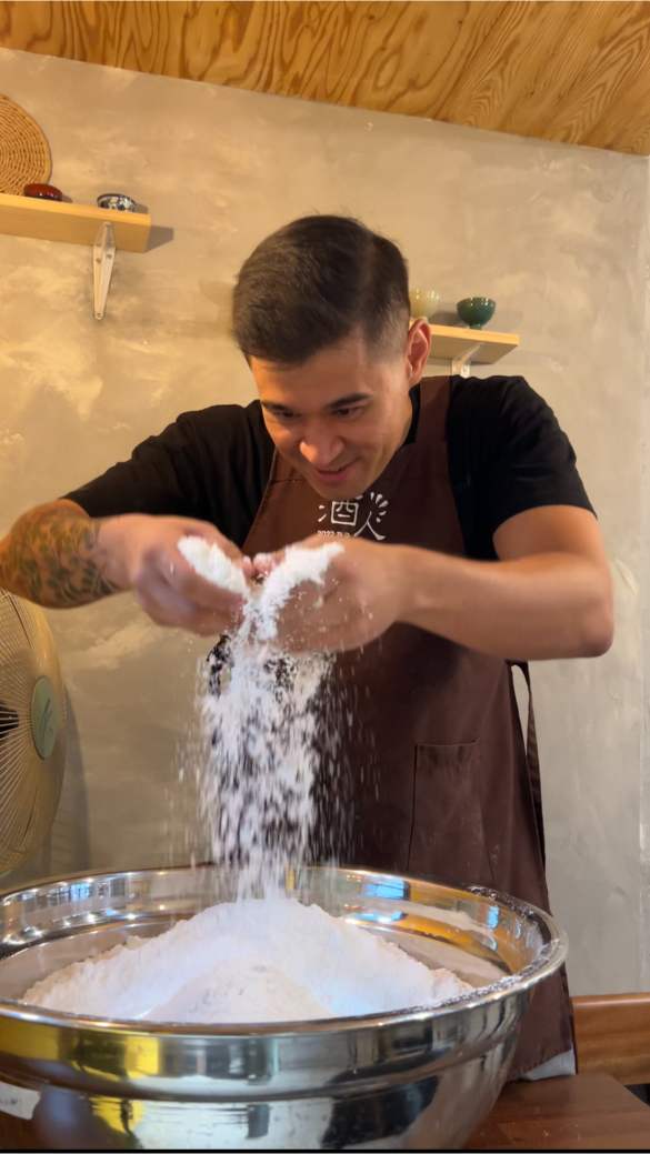 Dustin sifting Rice Flour at Baekusaeng