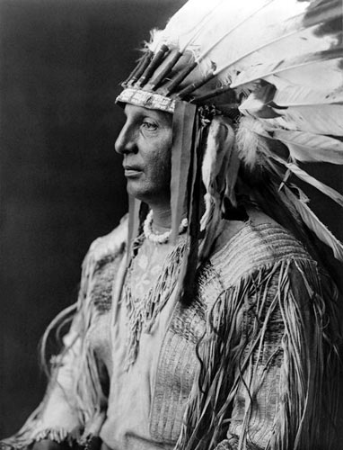 Arikara warrior, White Shield by Edward S. Curtis, 1908.