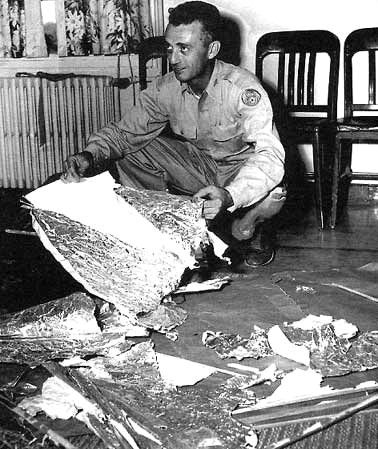 Major Marcel at Fort Worth, Texas, with balloon debris.