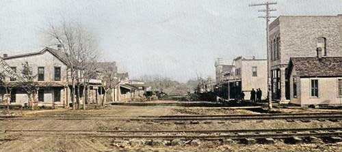 Early 1900s Savonburg, Kansas. Touch of color by LOA