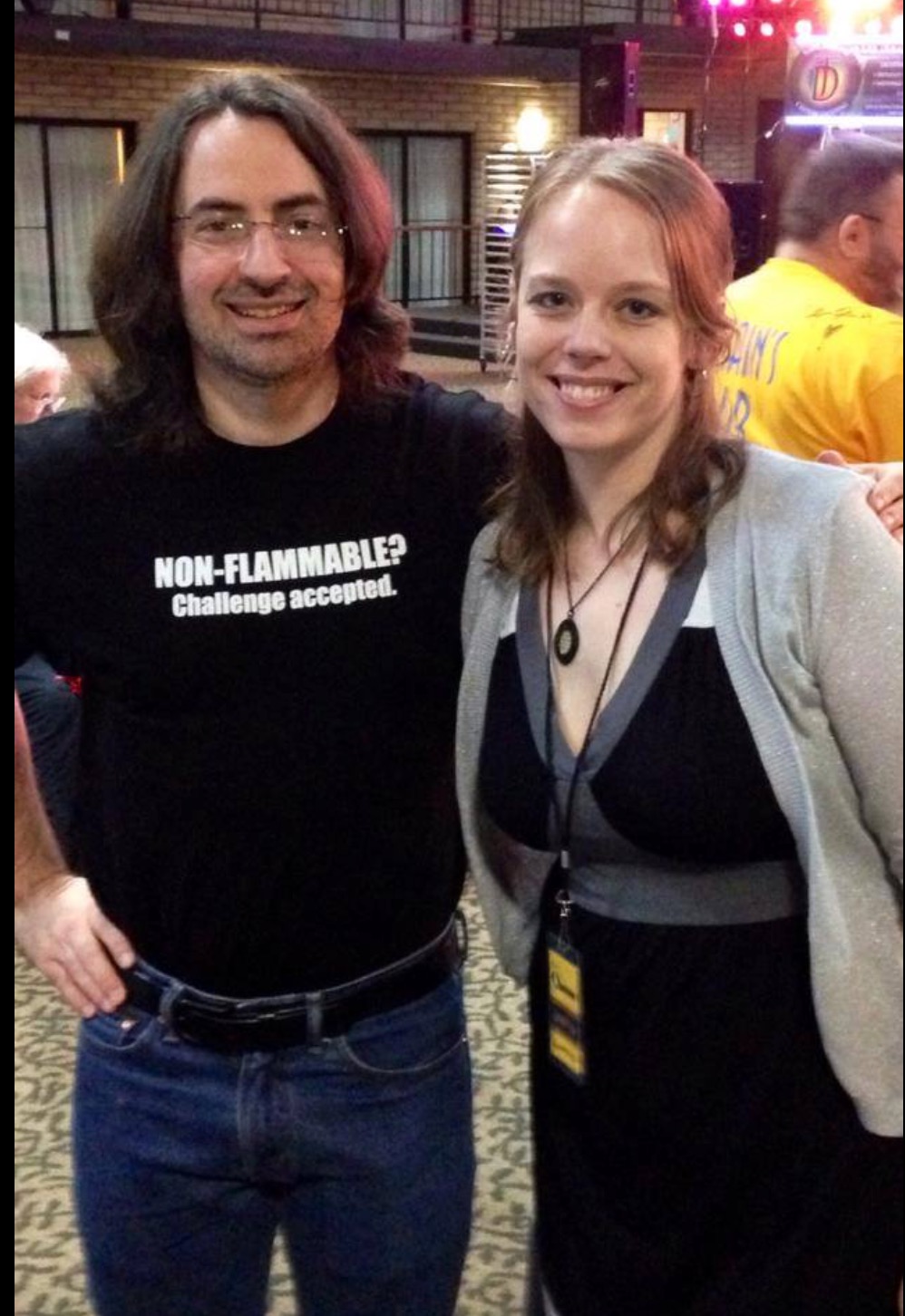 Picture of a younger Jim Butcher (with long brown hair!) and a youthful Melisaa F. Olson smiling as they pose together at a con.
