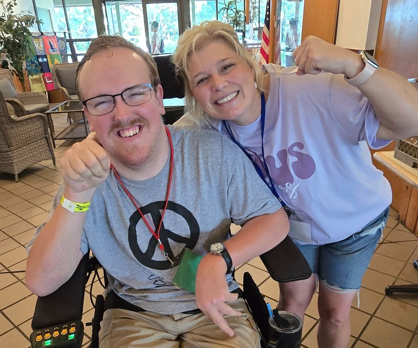 A man and woman are smiling and looking ready for a fun summer.