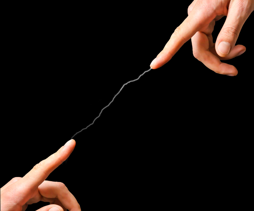 Two hands with a connection between them