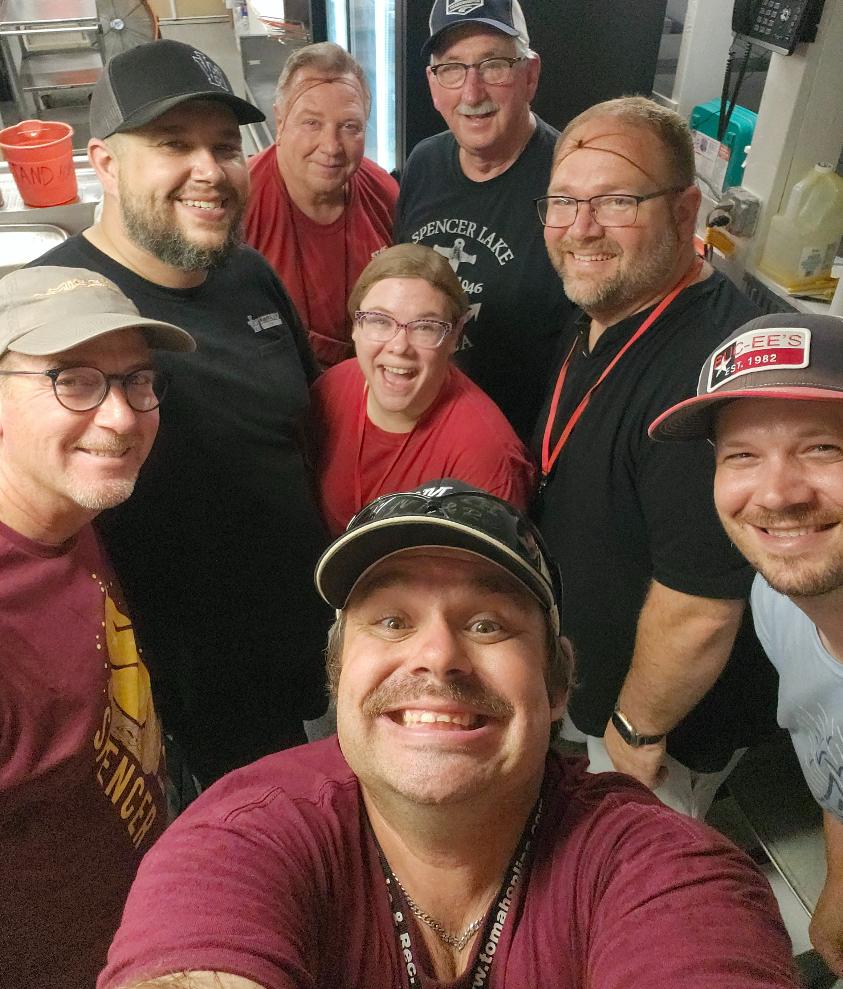 A group of people volunteering in the Snack stand