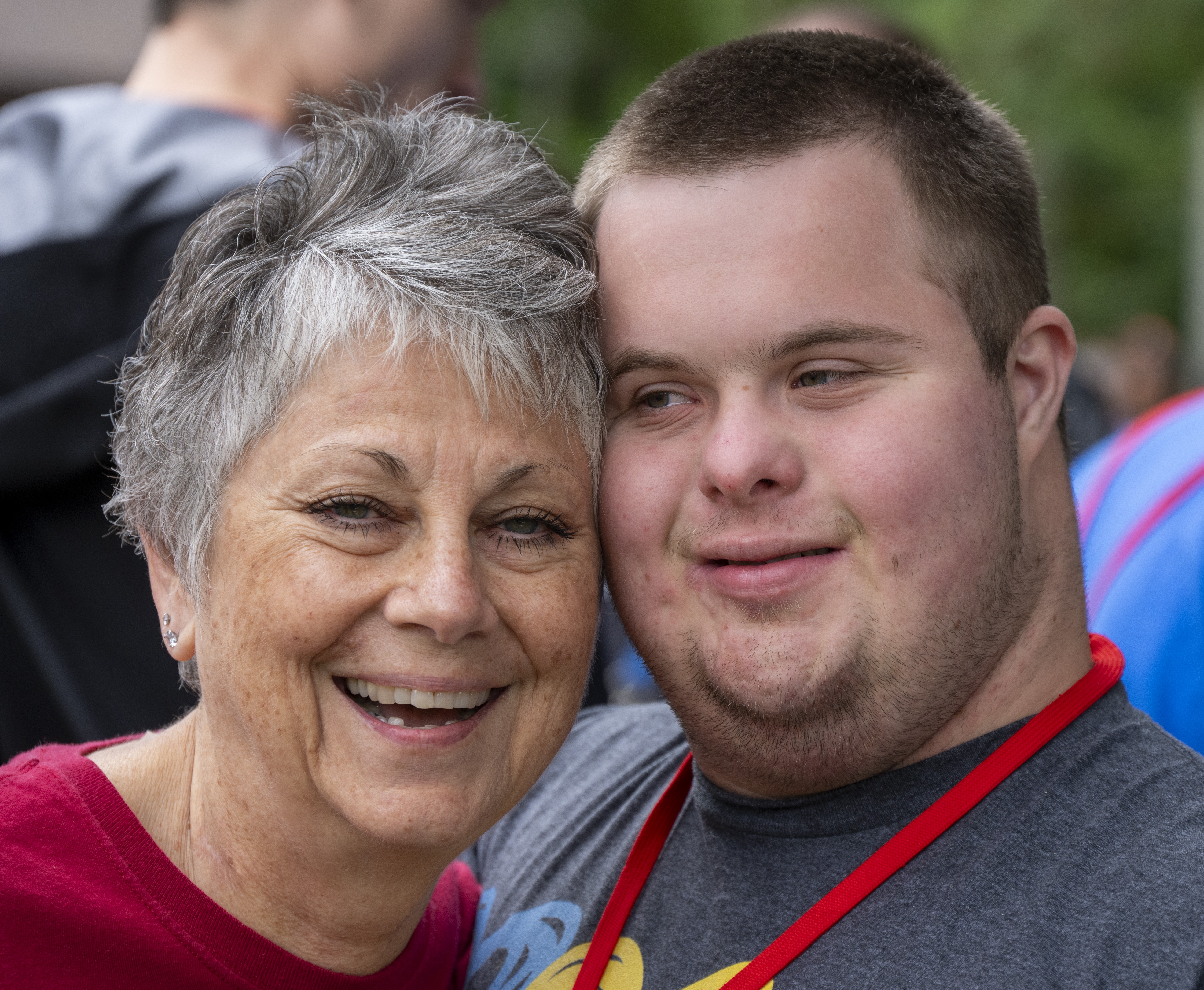 Executive Director, Debbie with guest Zach smiling for picture
