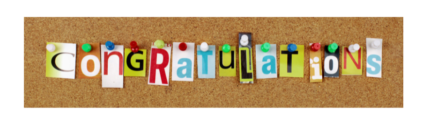 Congratulations in letters tacked up on peg board