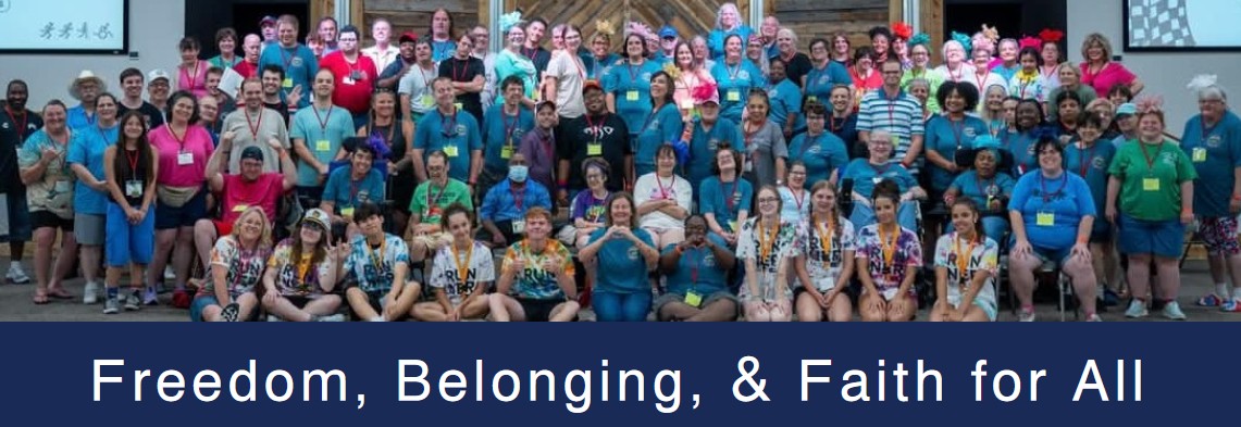 Freedom, Belonging, & Faith for All - a large group of people of all abilities in a group photo
