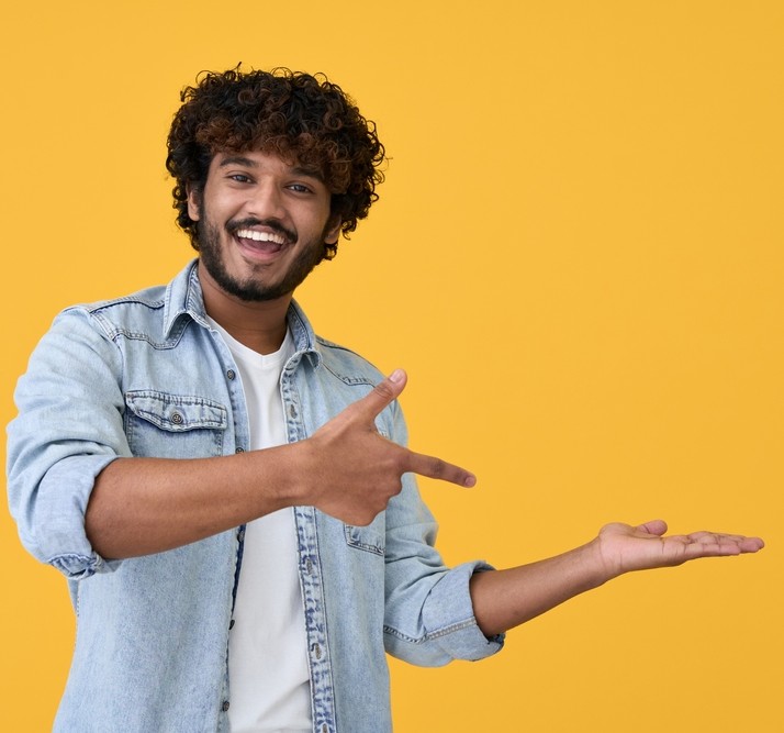 Man pointing to information on the right.