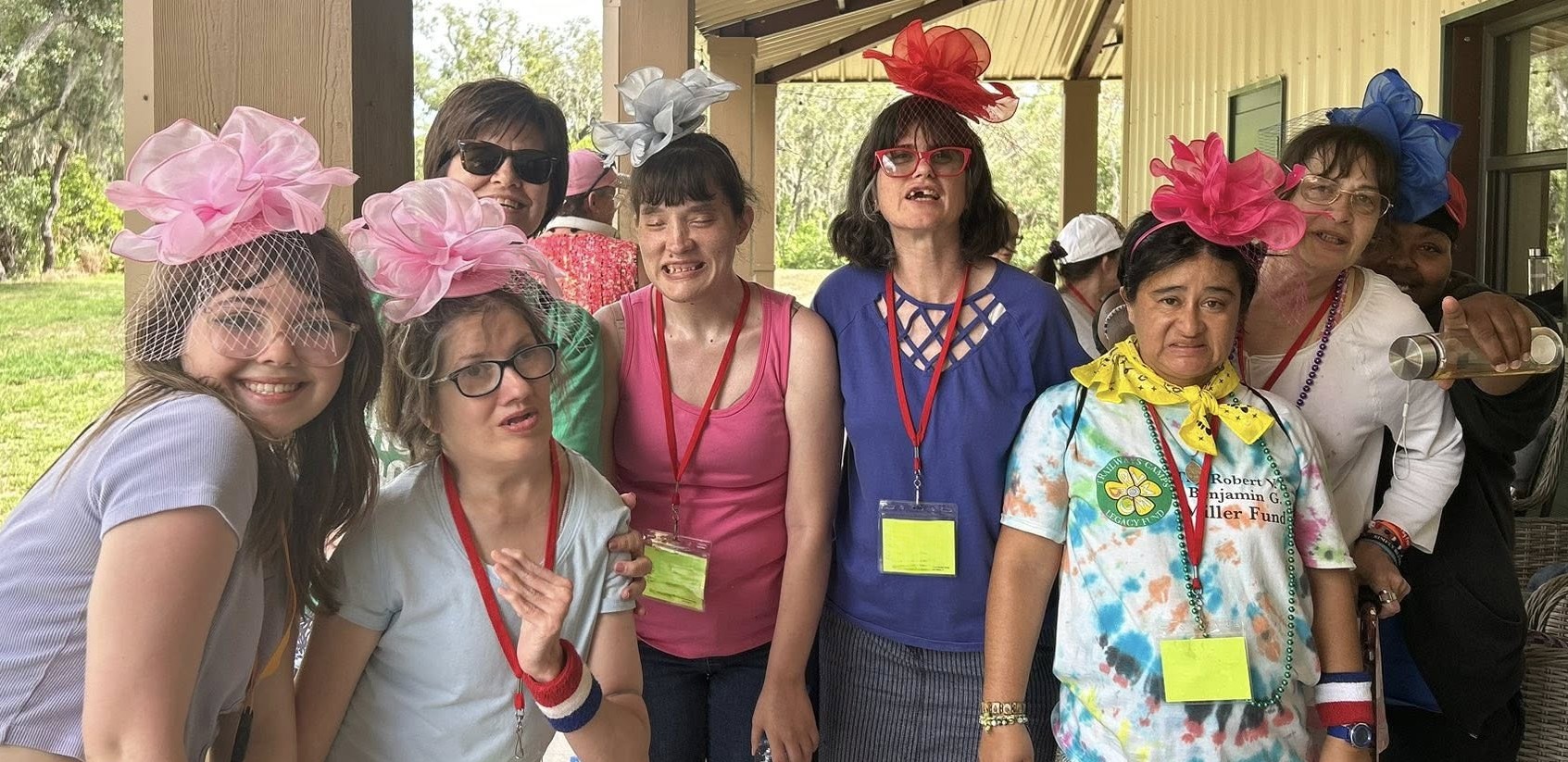a group of girls and woman all dressed in fun head pieces