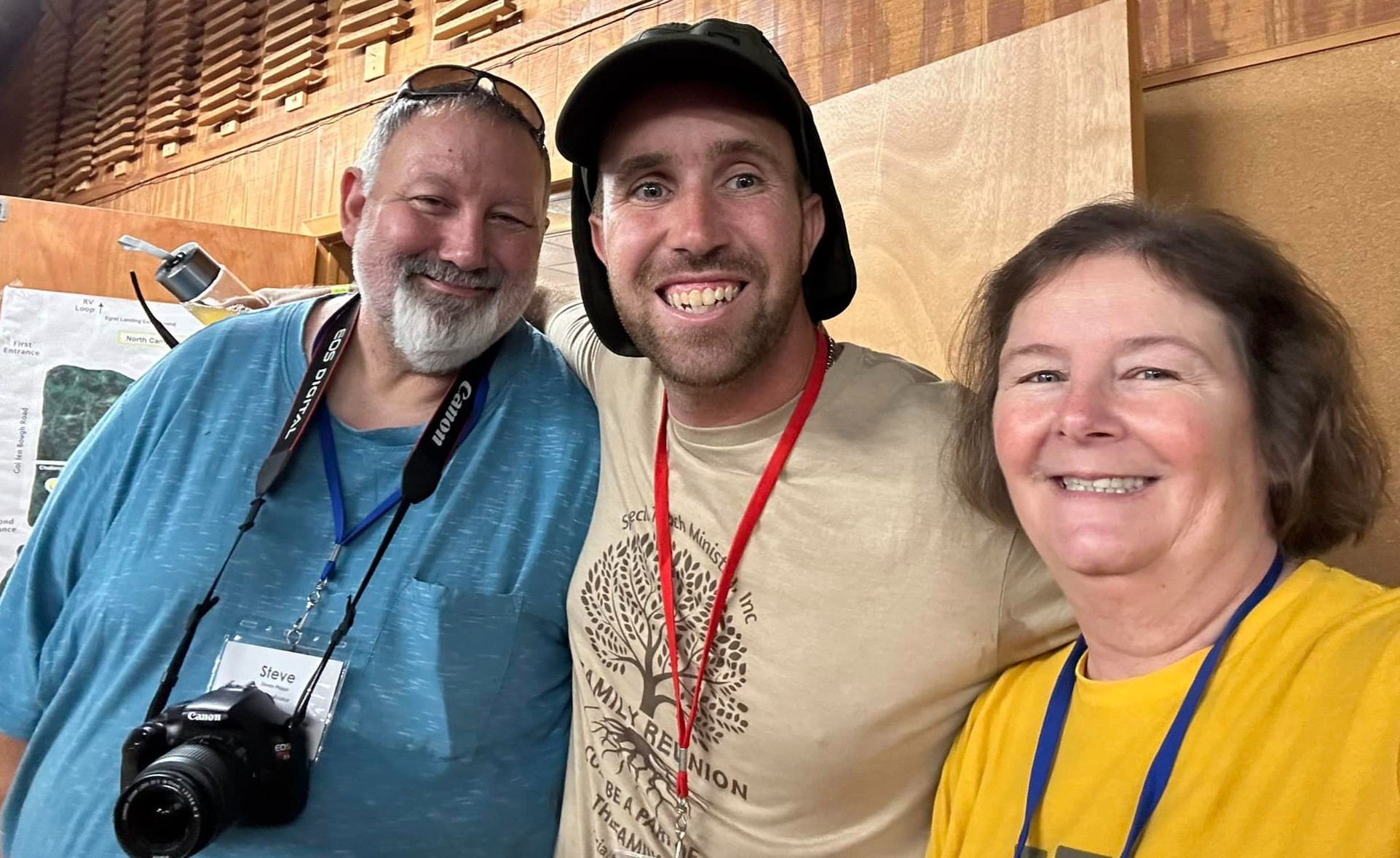 Charlene & Steve Phipps with additional man smiling