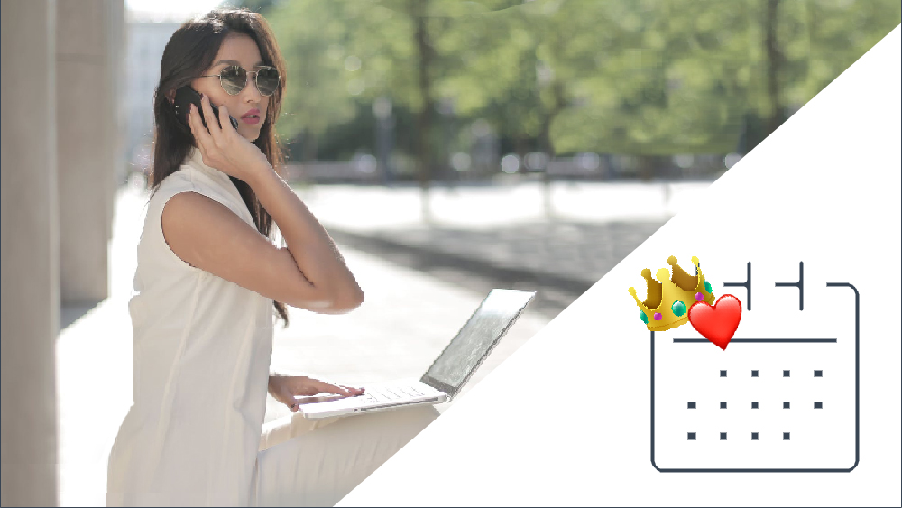 Woman on cell phone with laptop, Success + Love Calendar