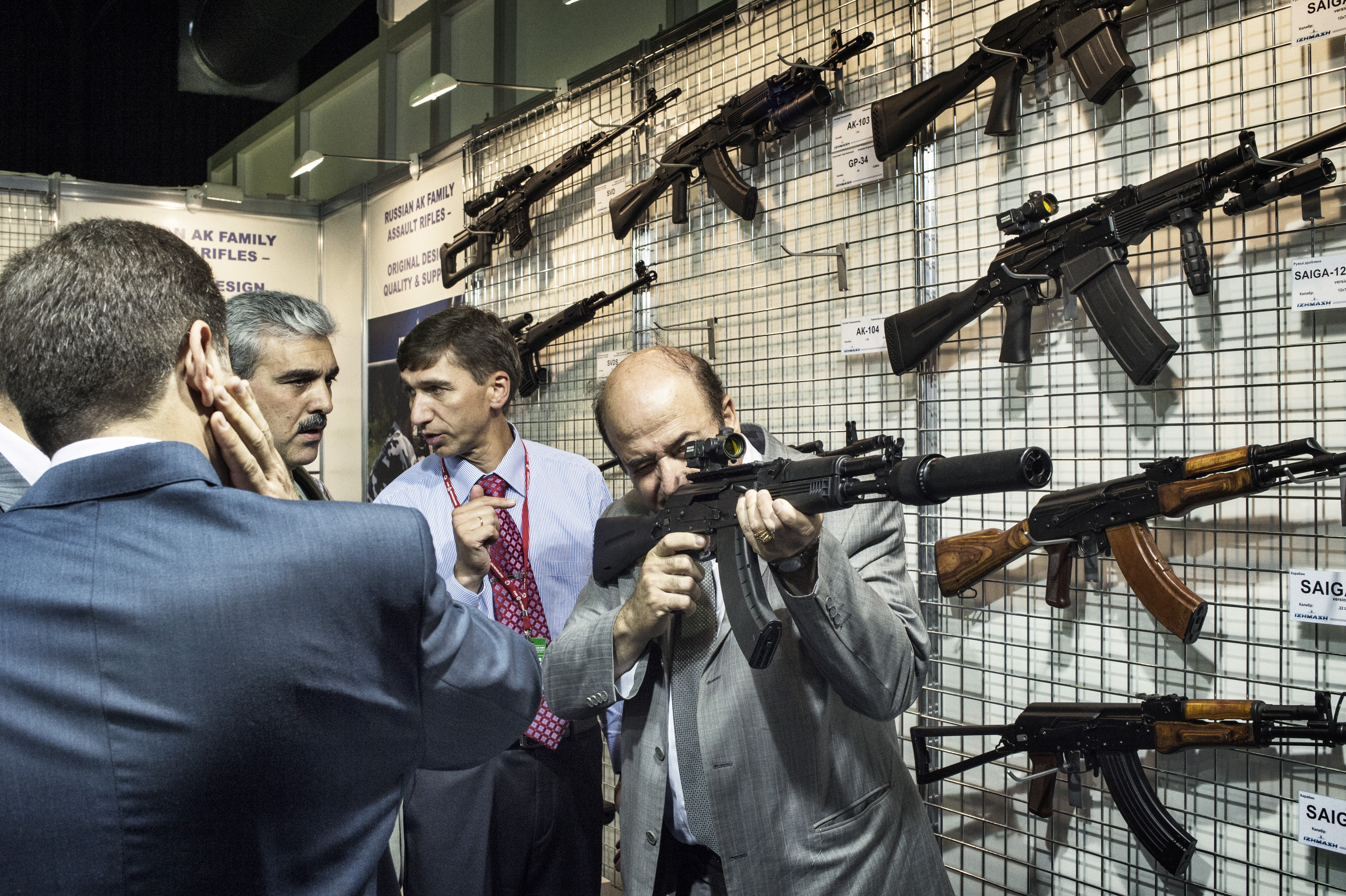 © Yuri Kozyrev / NOOR Caption: Russia, Moscow, 2012, The head of the Syrian delegation to Russia's biennial arms bazaar shakes hands with a representative of Rosoboronexport, the Russian state weapons export monopoly. IG : @noorimages Twitter : @noorimages