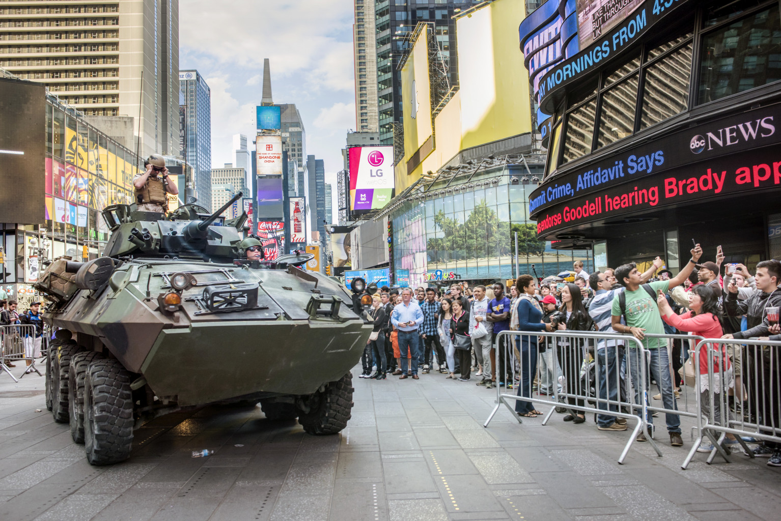 ©Nina Berman/ NOOR Caption: USA, New York, 2015, US Marines in Times Square for Fleet Week  - demonstration weapons including rifles and arriving in an armored personnel carrier. IG: @nina_berman Twitter: @ninaberman
