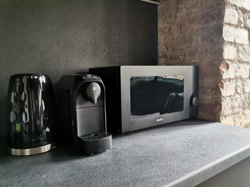 Ekspres do kawy, czajnik elektryczny oraz mikrofala