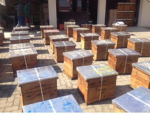 Our bee hives packed for delivery include metal queen excluders © Bee Ware