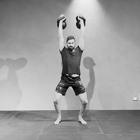 The double kettlebell clean and jerk