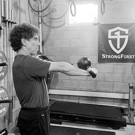 Steve Freides showing the kettlebell forward press