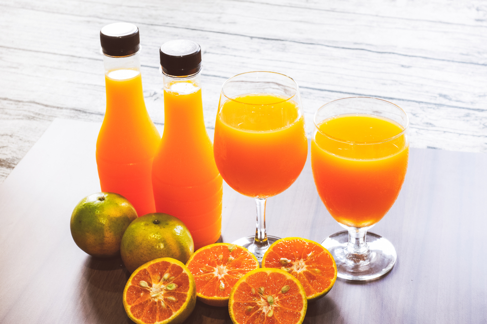 Fresh orange juice and bottled orange