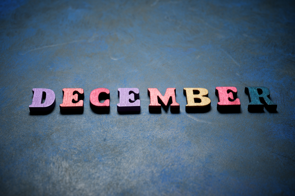 December word on a blue table