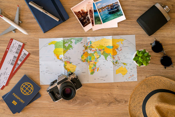 Travel documents, camera, map, and other items related to travel