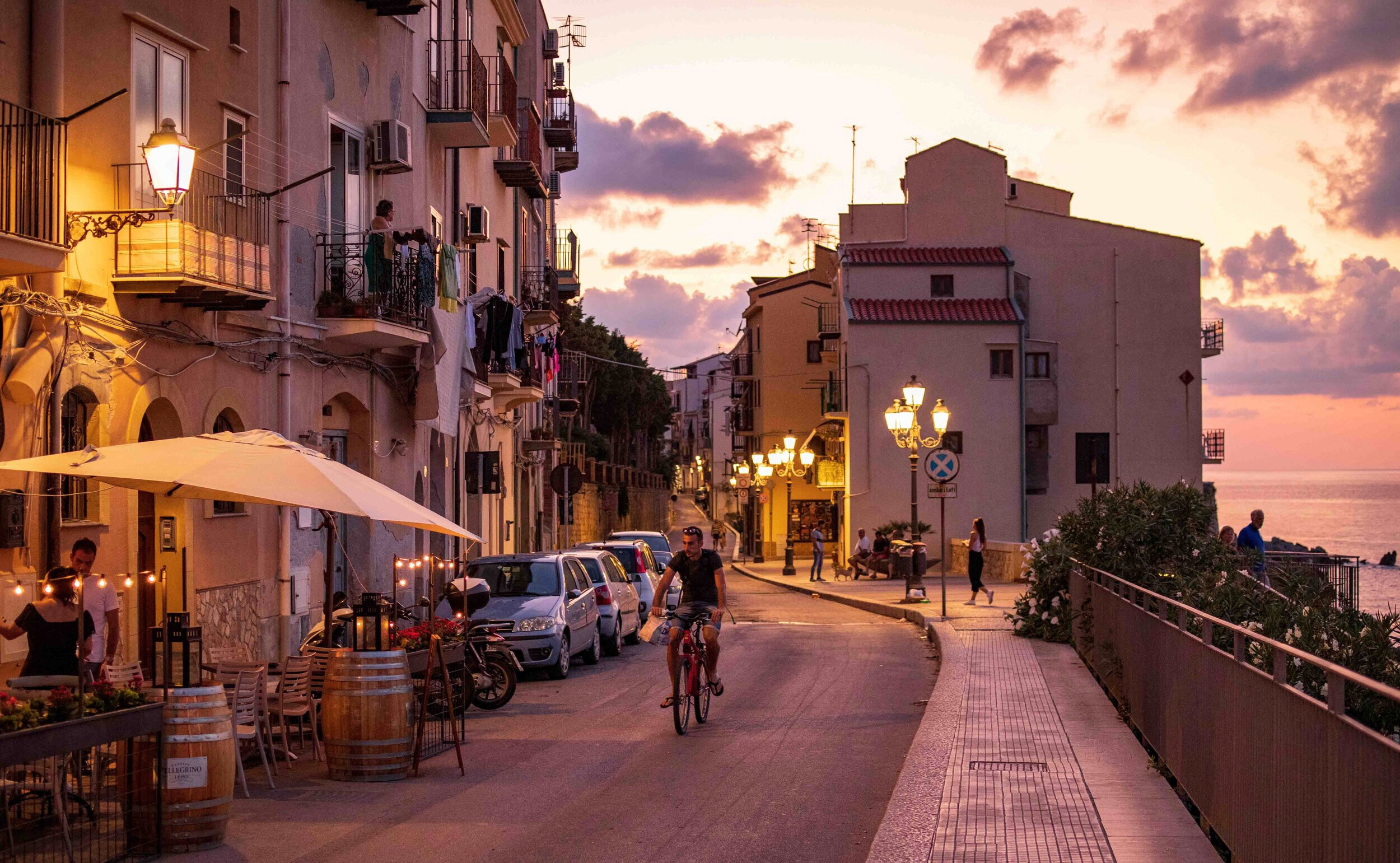 Street view in Cefalu, Sicily at sunset