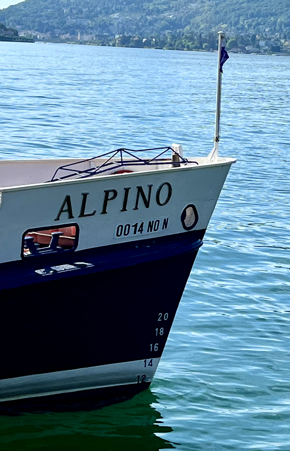 The bow of a ship on the water of Lake Maggiore in Italy