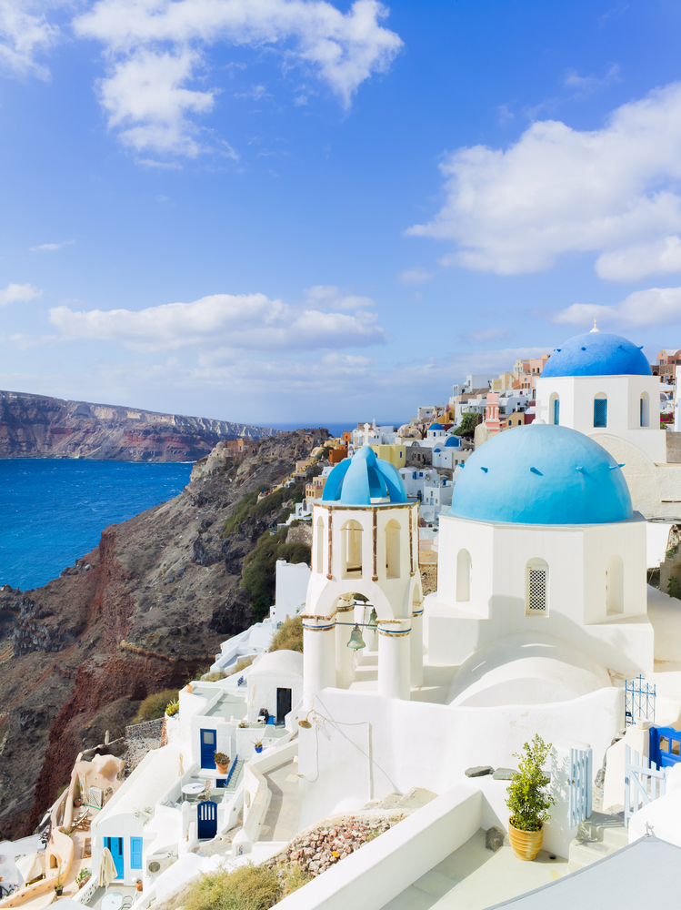 blue and white buildings in Santorini Greece