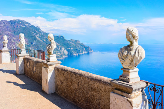 Statue heads in Amalfi Coast overlooking the sea
