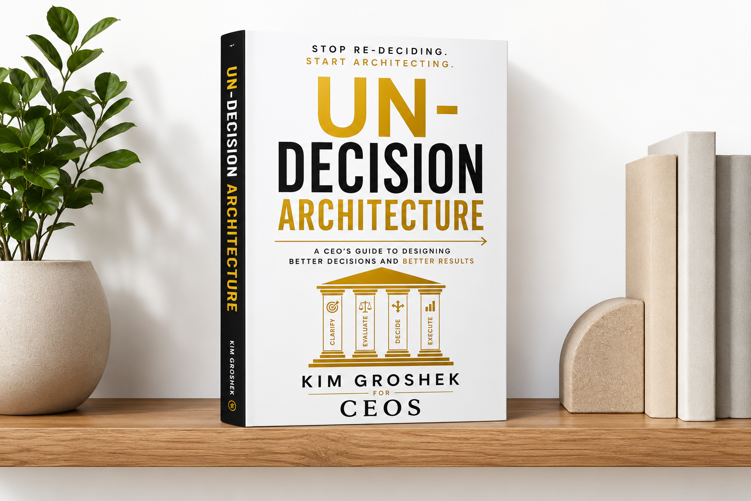UN-DECISION Architecture by Kim Groshek displayed upright on a modern bookshelf