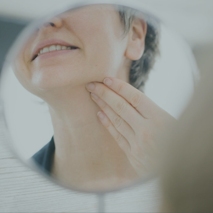 lifting jawline holding face