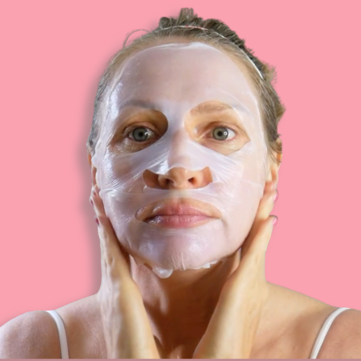 jen holding mask on face