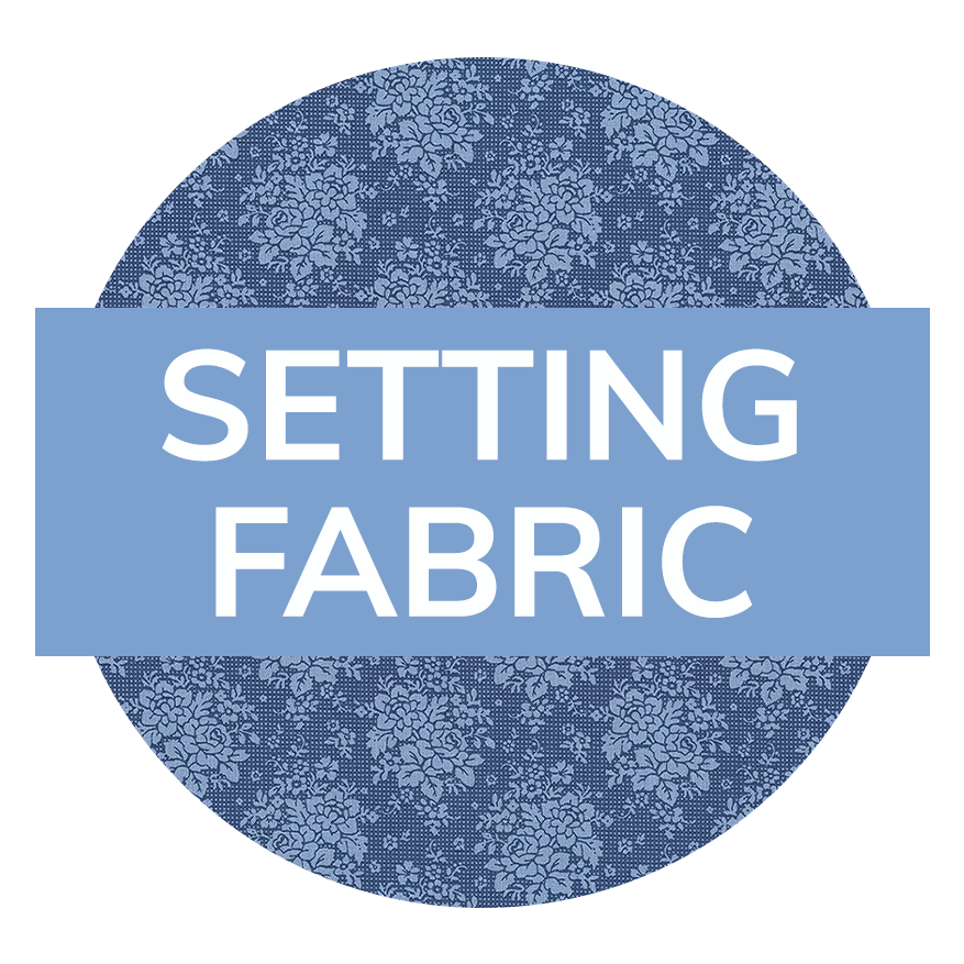 A photo of blue fabric with the text “Setting Fabric“