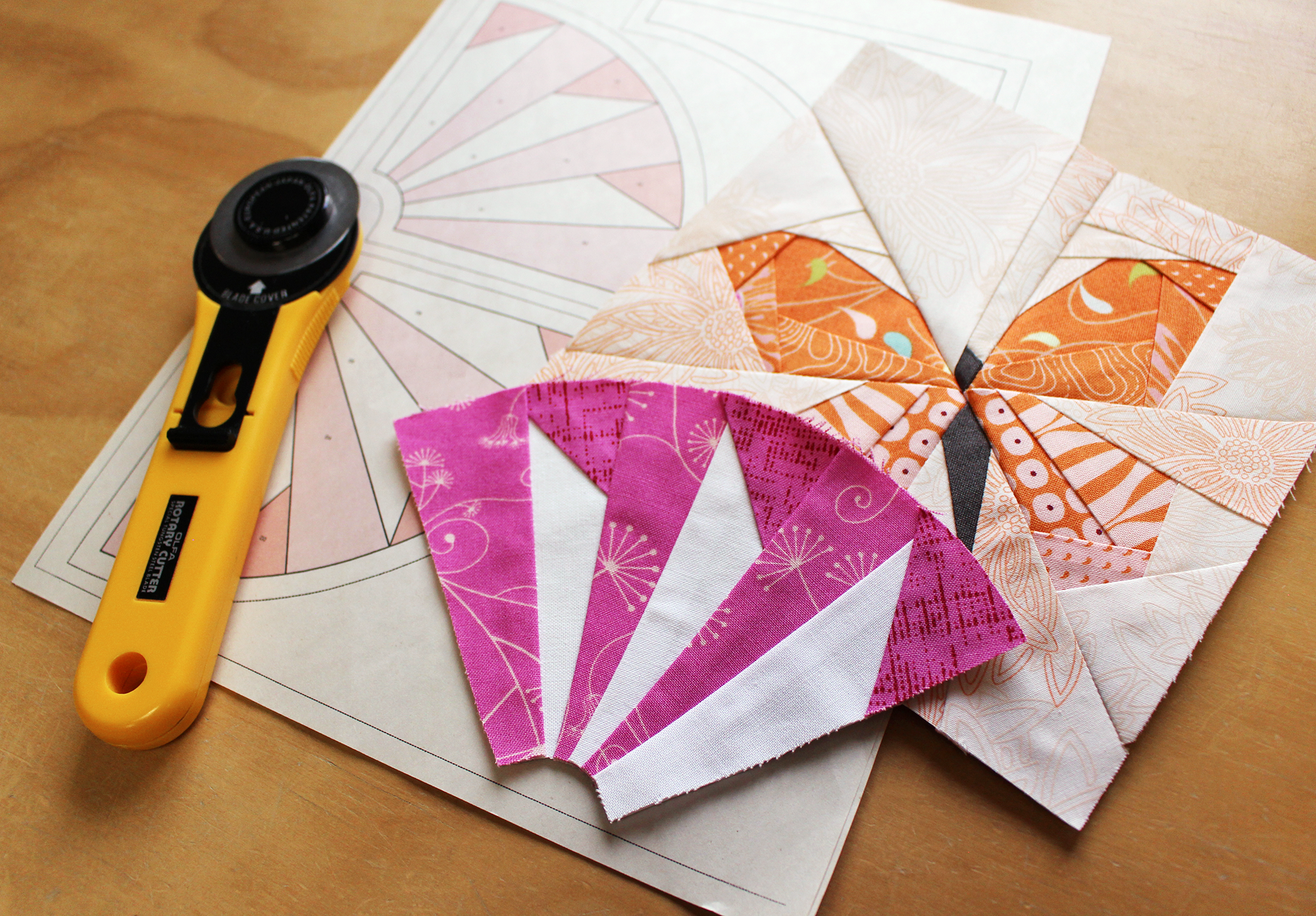 Print paper-piecing patterns onto a sheet, then sew directly over it.