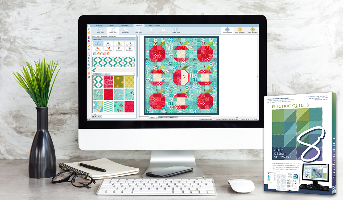 An image of EQ8 software with an apple quilt on the screen